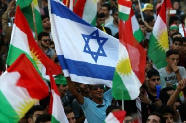 Israeli flag flown alongside Kurdish flags at rally in Arbil on Friday (September 15, 2017) in support of referendum (AFP)
